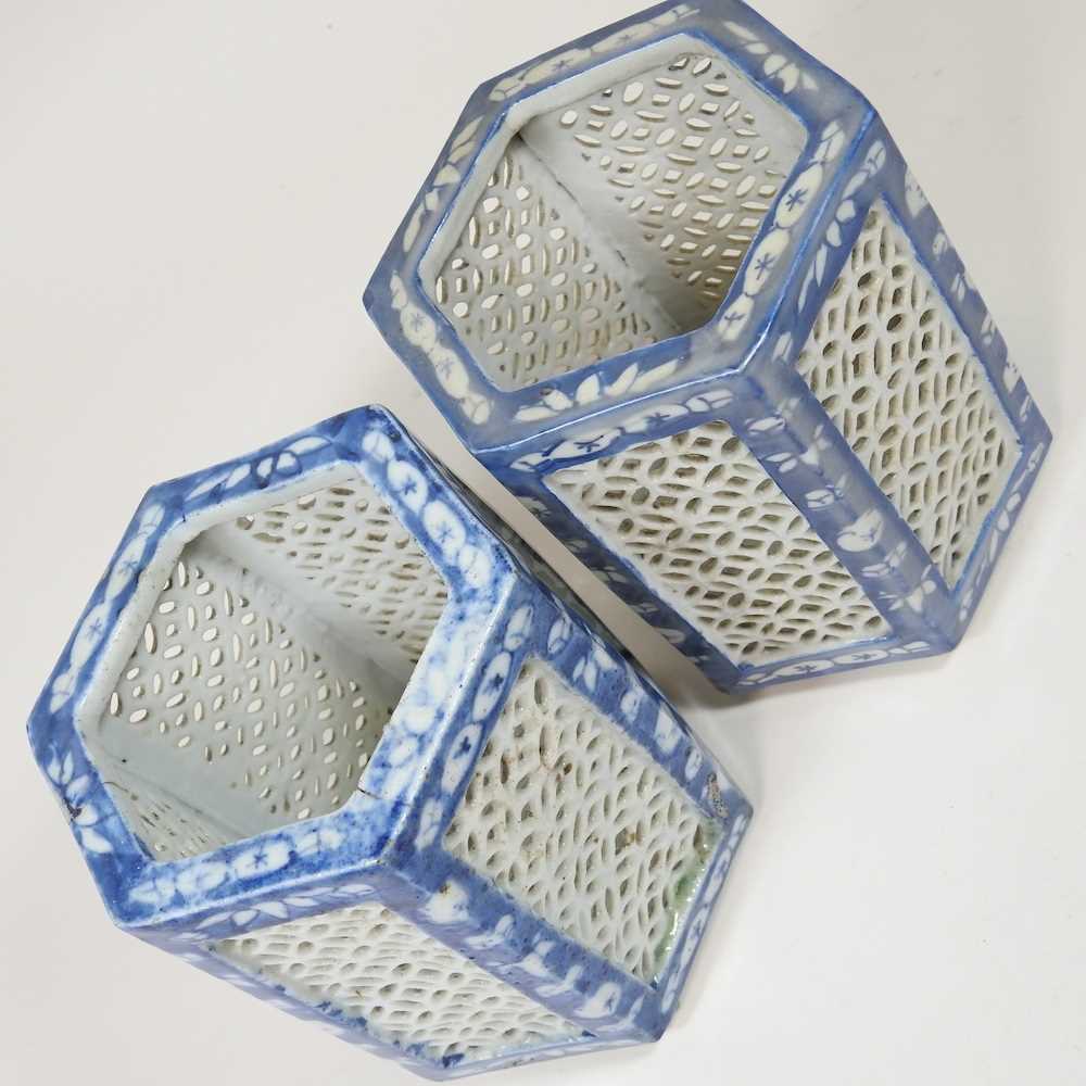 A pair of Chinese porcelain blue and white tea light holders, 20th century, with pierced panels, - Image 3 of 7