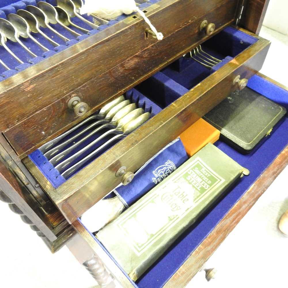 A 1920's canteen of silver plated cutlery, with a hinged lid and drawers below, with a twelve - Image 6 of 8