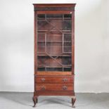 An early 20th century astragal glazed bookcase, with drawers below 83w x 34d x 199h cm