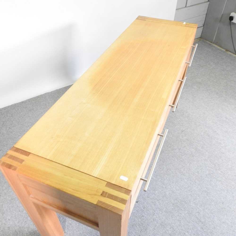 A modern light oak console table, containing three drawers 150w x 45d x 75h cm - Image 3 of 5