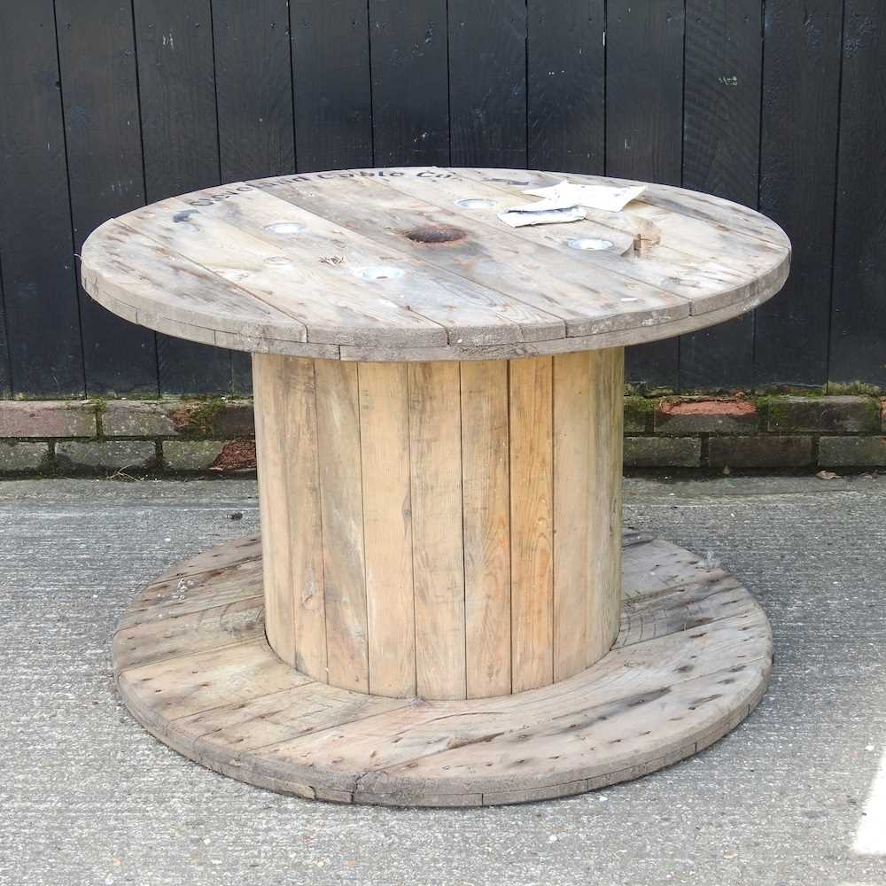 A wooden cable reel garden table 110w x 110d x 73h cm