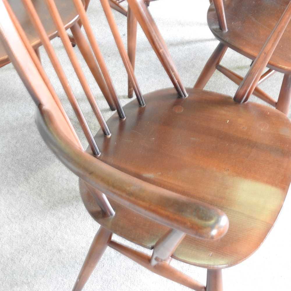 A set of six Ercol dark elm hoop back dining chairs, to include a pair of carvers (6) - Image 4 of 7