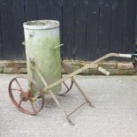 A galvanised water bowser, on a metal stand, 86cm high