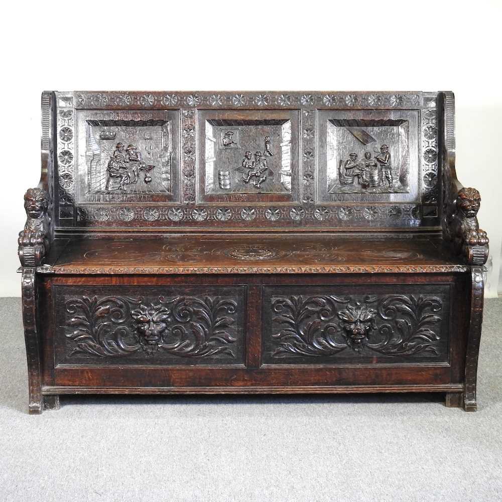 A 19th century Dutch heavily carved dark oak box settle, the panelled back carved with tavern - Bild 6 aus 6