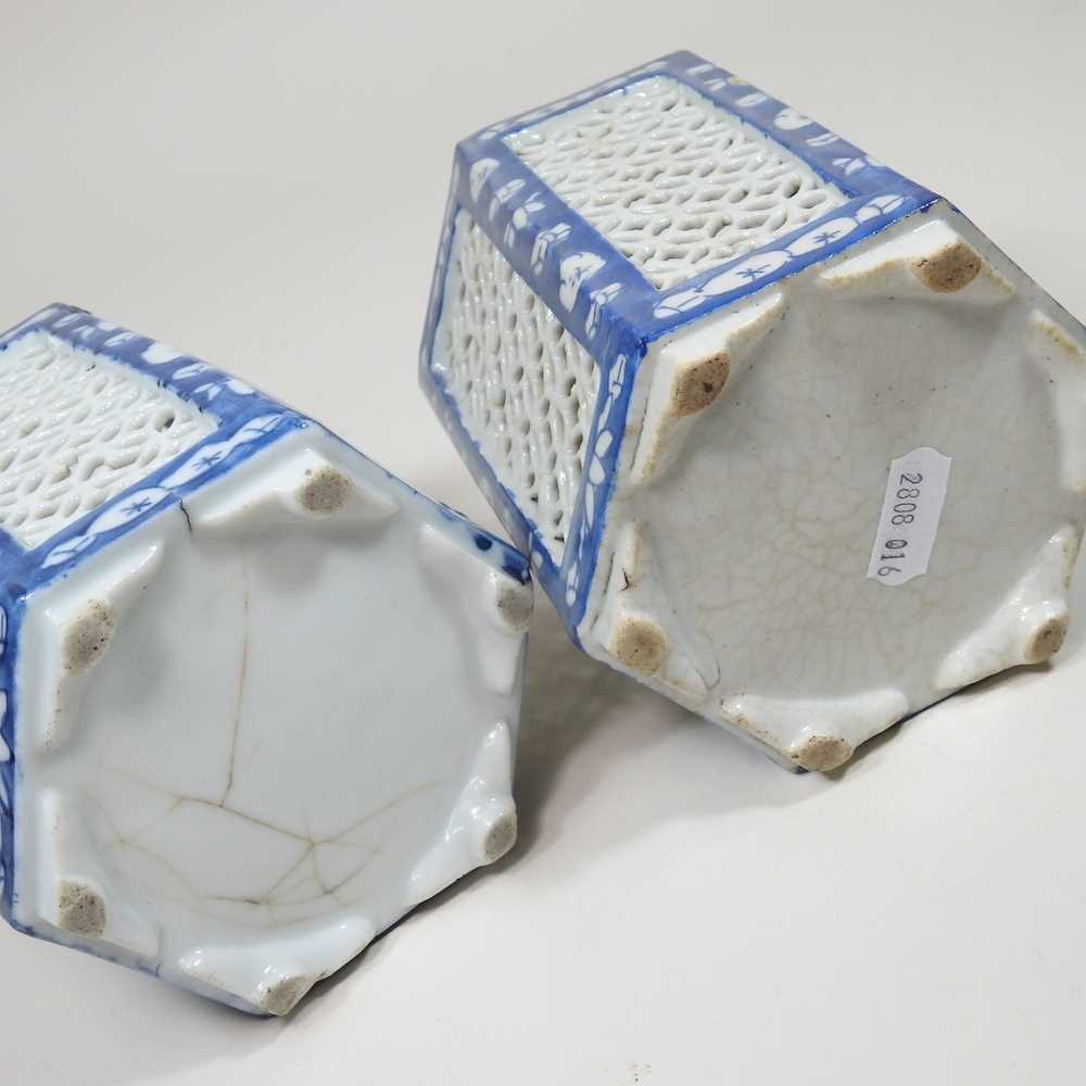 A pair of Chinese porcelain blue and white tea light holders, 20th century, with pierced panels, - Image 7 of 7