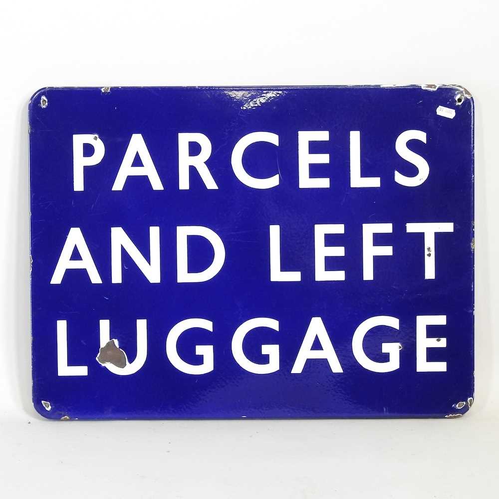 A vintage enamel Railway sign inscribed Parcels and Left Luggage, 46 x 61cm