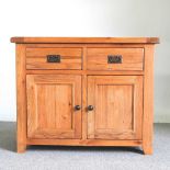 A modern light oak side cabinet 99w x 47d x 80h cm