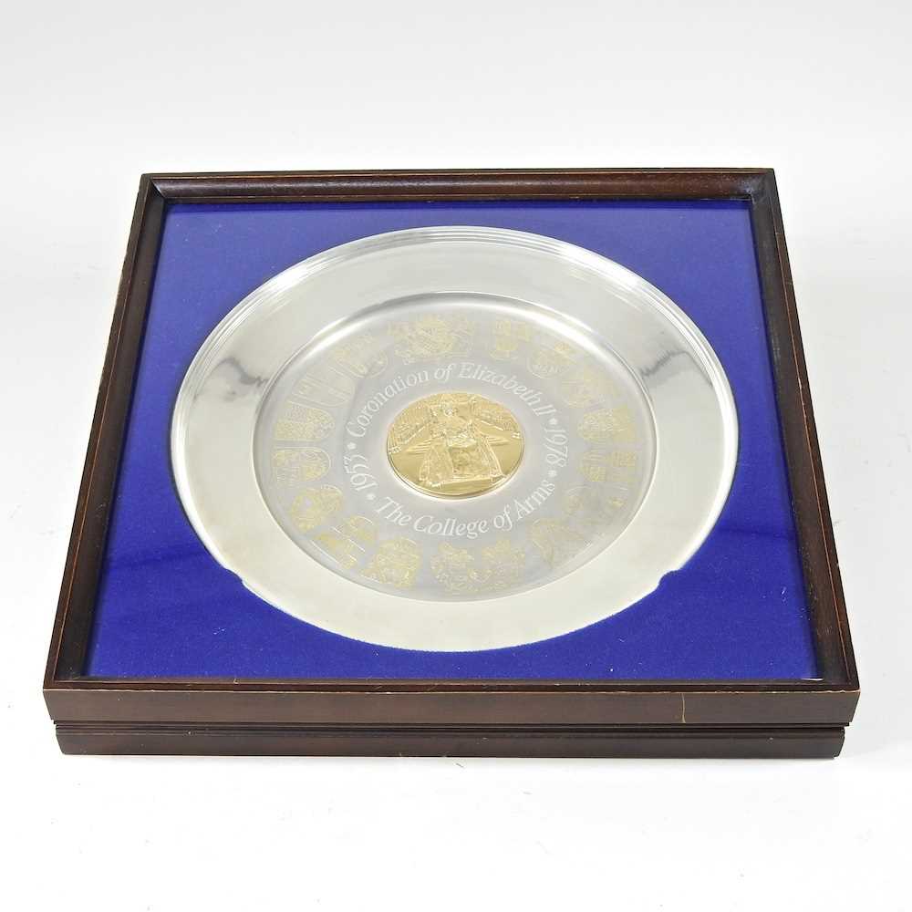 A Royal commemorative silver jubilee College of Arms silver and gilt dish, for the Coronation of