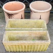 A pair of terracotta garden pots, 34cm high, together with a pair of cast stone garden troughs (4)