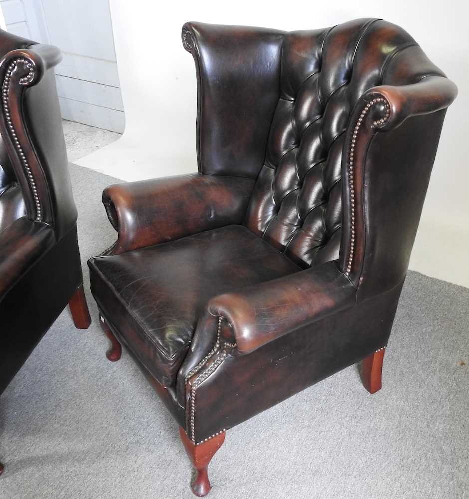 A pair of brown leather upholstered button back wing armchairs, on cabriole legs (2) - Image 3 of 7