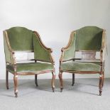 A pair of Edwardian marquetry green upholstered armchairs, on cabriole legs (2)