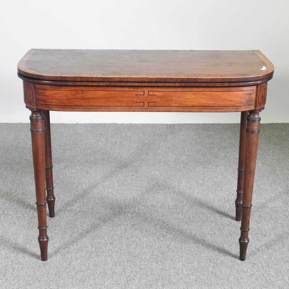 A Regency mahogany and crossbanded folding card table 91w x 45d x 75h cm