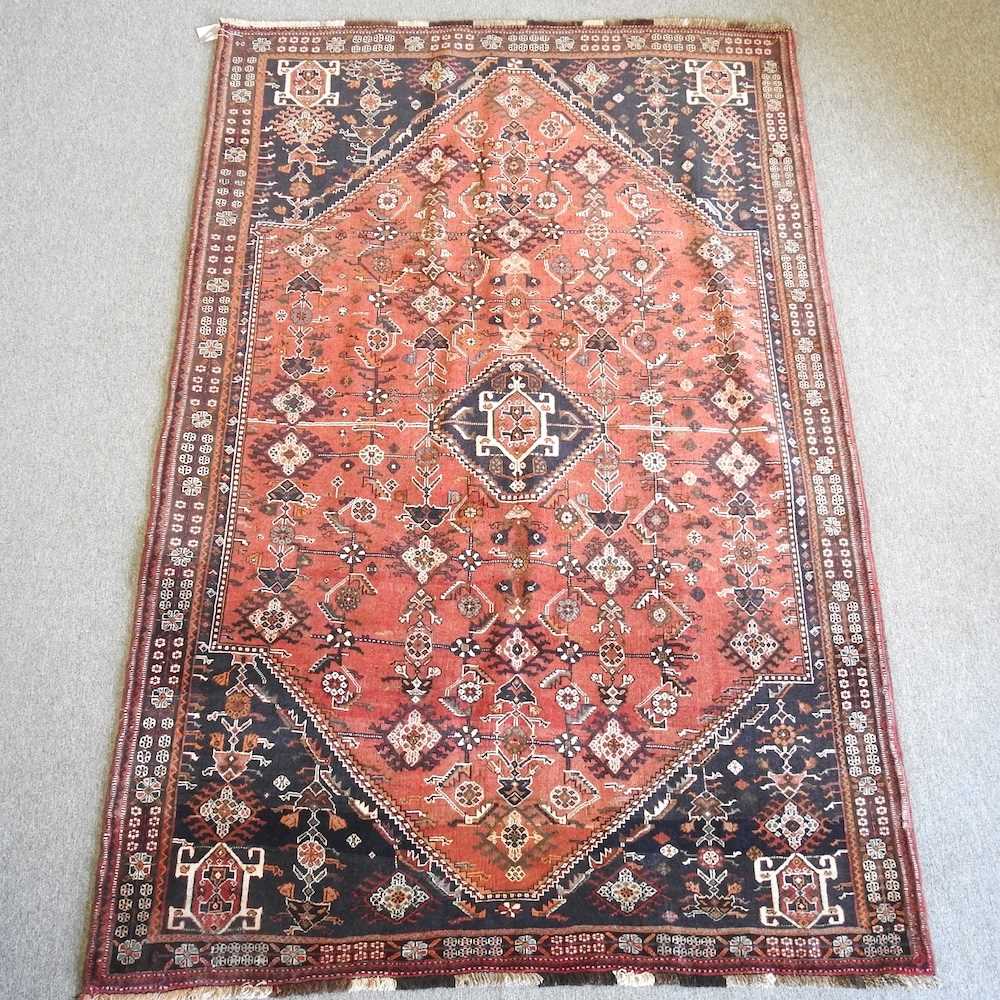 A Persian qashqai carpet, with all over medallions, 255 x 160cm