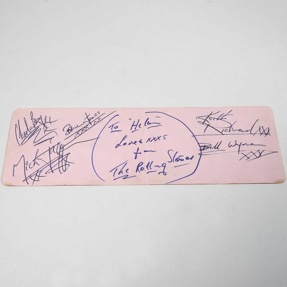 A page from an autograph book with the signatures of The Rolling Stones, Brian Jones, Keith - Image 2 of 6