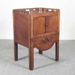 A George III mahogany bedside commode, on square moulded legs 53w x 44d x 79h cm