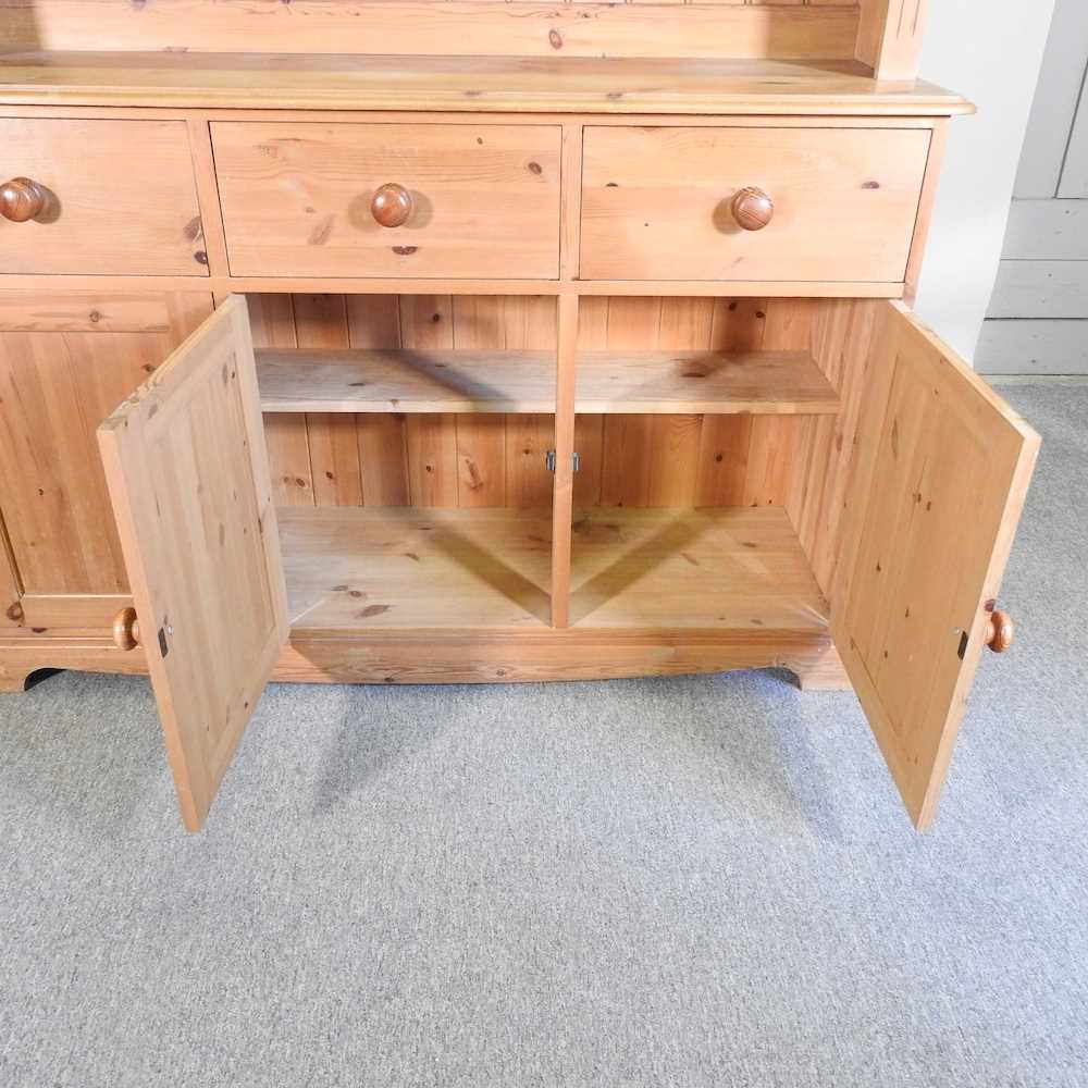 A modern pine dresser, with an arcaded back, with drawers and cupboards below 143w x 200h x 43d cm - Image 6 of 6