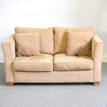 A Collins & Hayes beige suede upholstered sofa, with loose cushions 165w x 106d x 85h cm This is