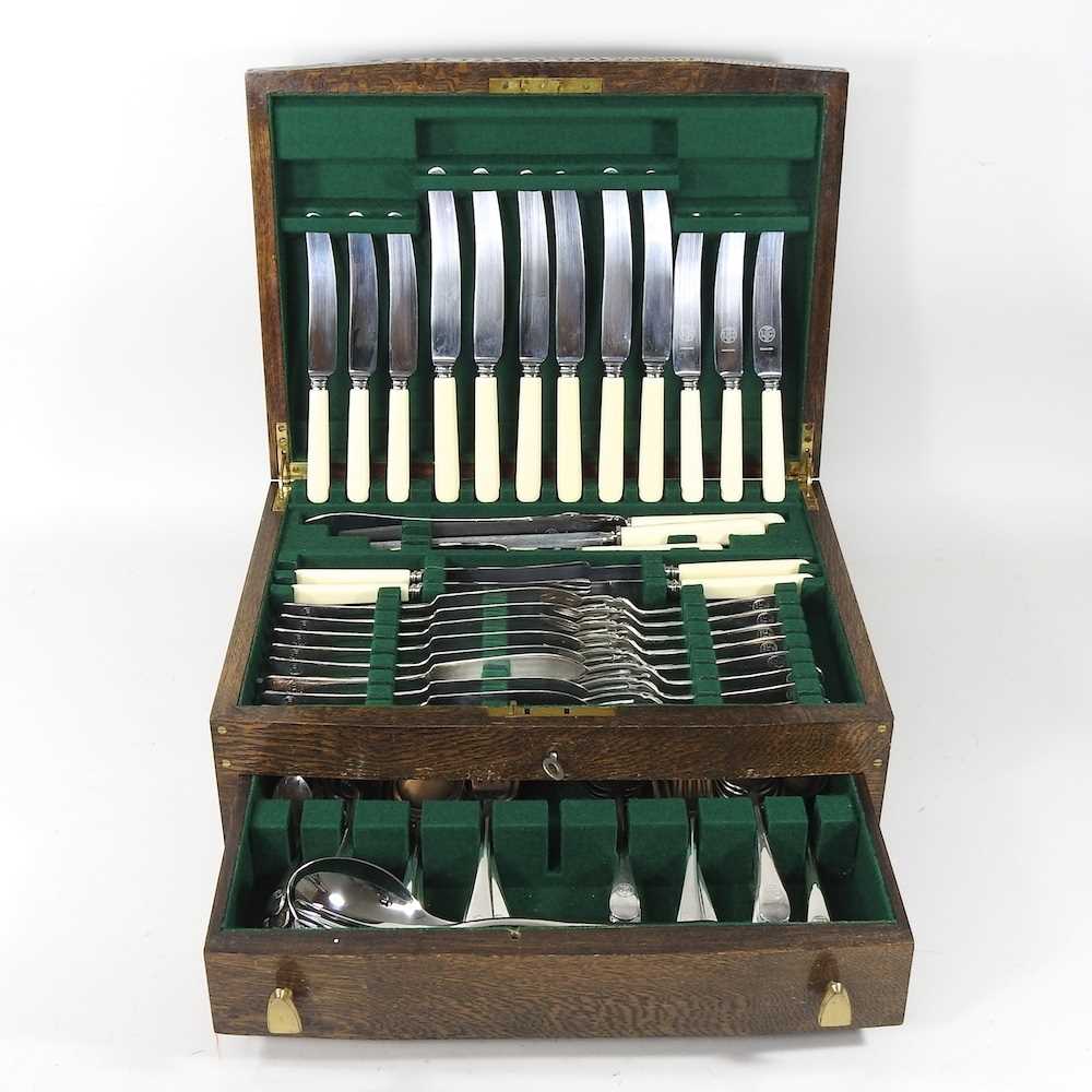An early 20th century canteen of silver plated cutlery, with six place settings, in a fitted