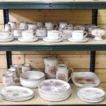 A Denby Gypsy pattern stoneware part tea and dinner service, decorated with flowers