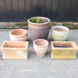 A terracotta garden pot, 48cm high, together with five various garden pots (6)