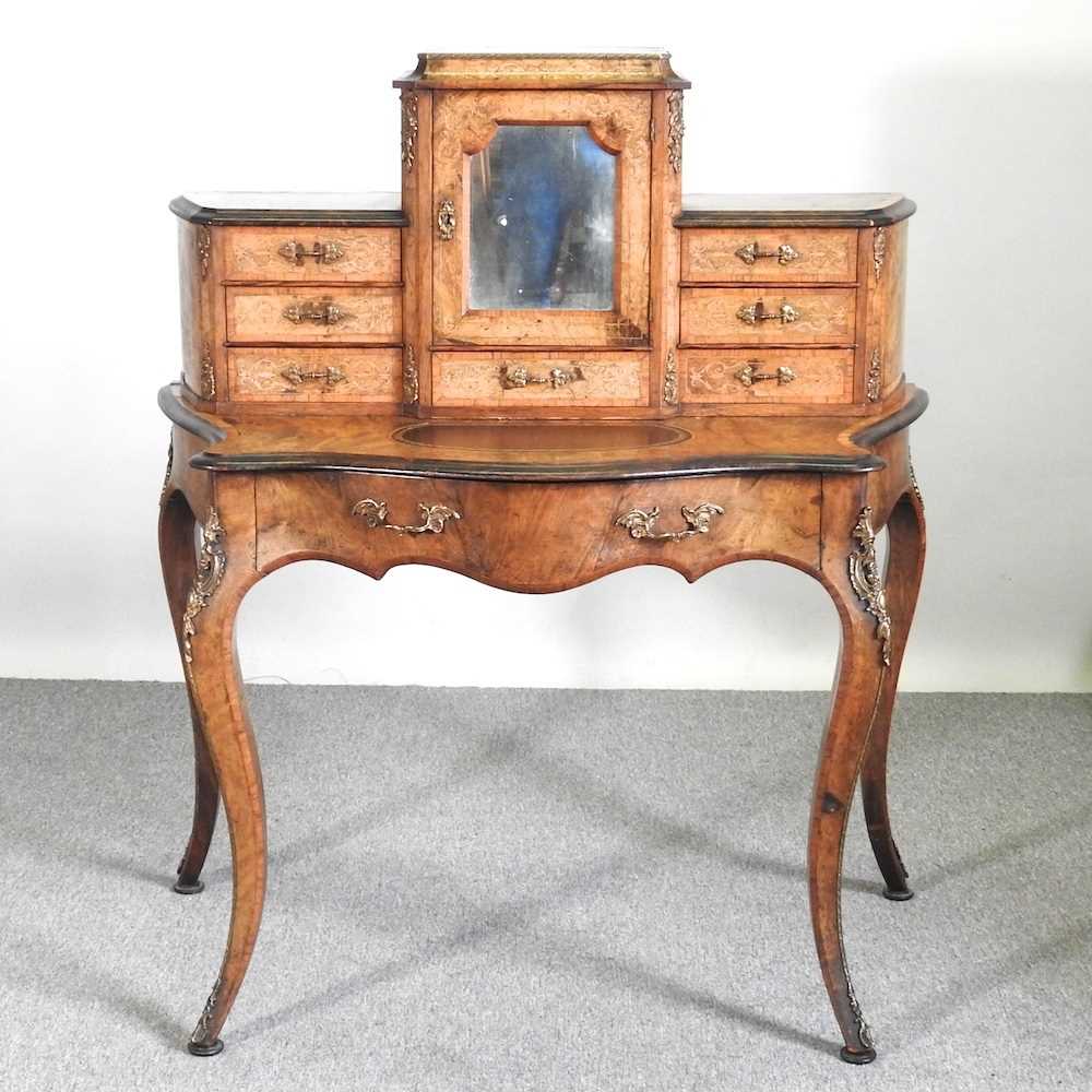 A good quality Victorian walnut, marquetry and gilt metal mounted bonheur du jour, with an inset