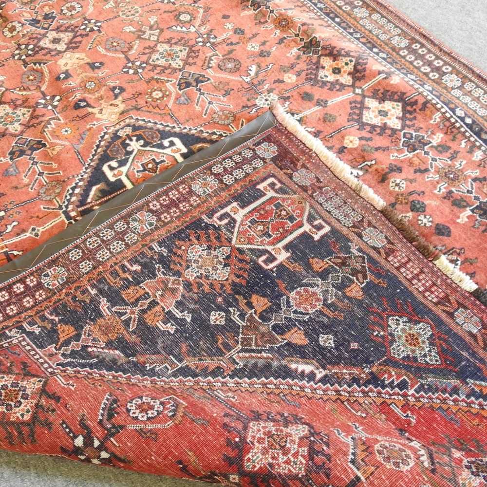 A Persian qashqai carpet, with all over medallions, 255 x 160cm - Image 2 of 4