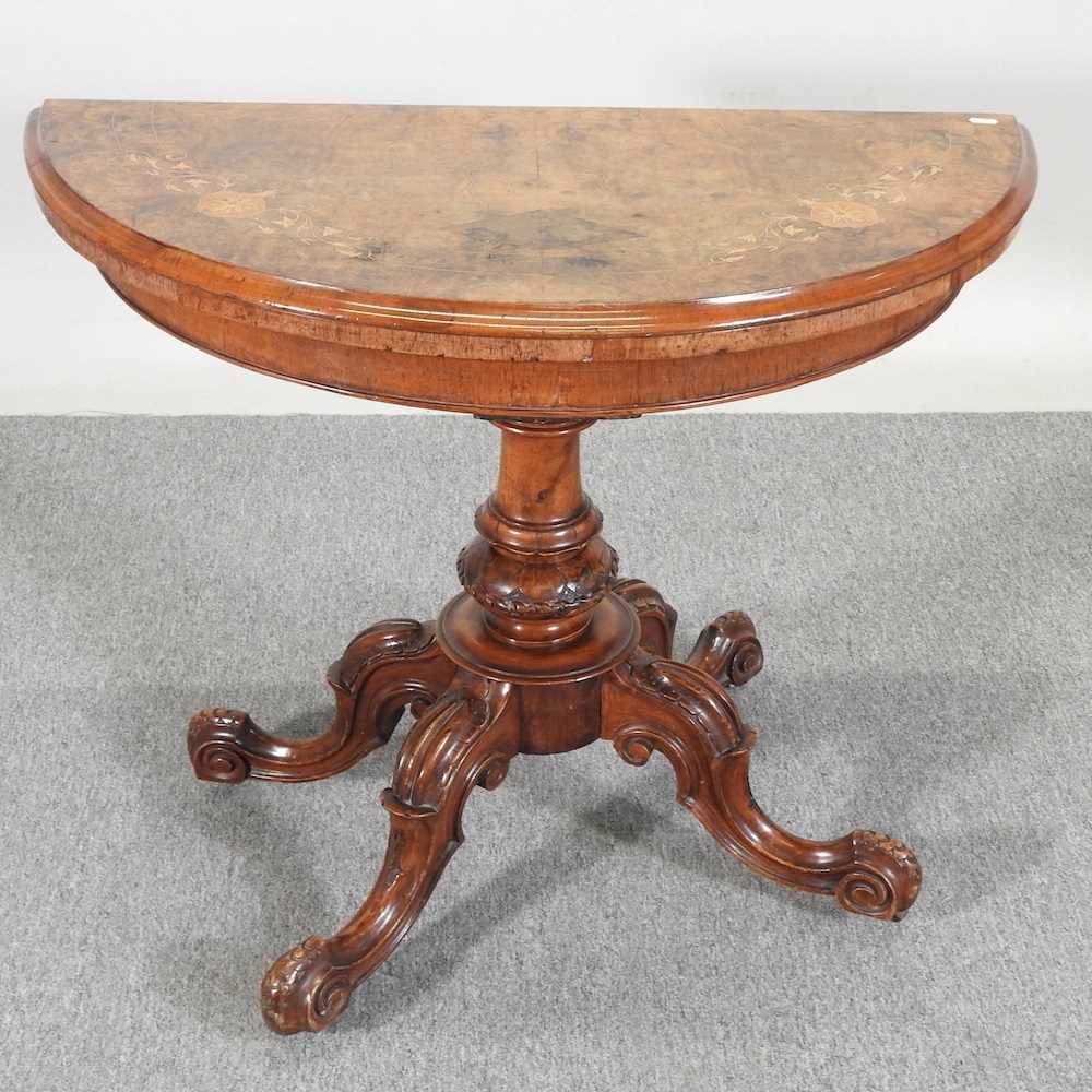 A Victorian burr walnut and marquetry folding card table, with a hinged half round top, on a - Image 3 of 5