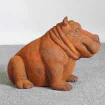 A rusted metal garden model of a hippo, 27cm high