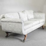 A Regency and later pale blue damask upholstered scroll end sofa, on sabre legs and castors 210w x
