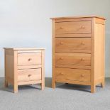A modern Corndell light oak chest of drawers, together with a matching bedside chest (2) 63w x 43d x