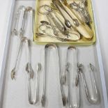 A collection of eight George III and later silver sugar tongs, various dates and makers, 174g gross,