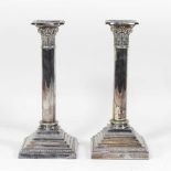 A pair of early 20th century silver plated table candlesticks, 25cm high Overall condition looks