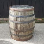 A coopered wooden barrel, 90cm high