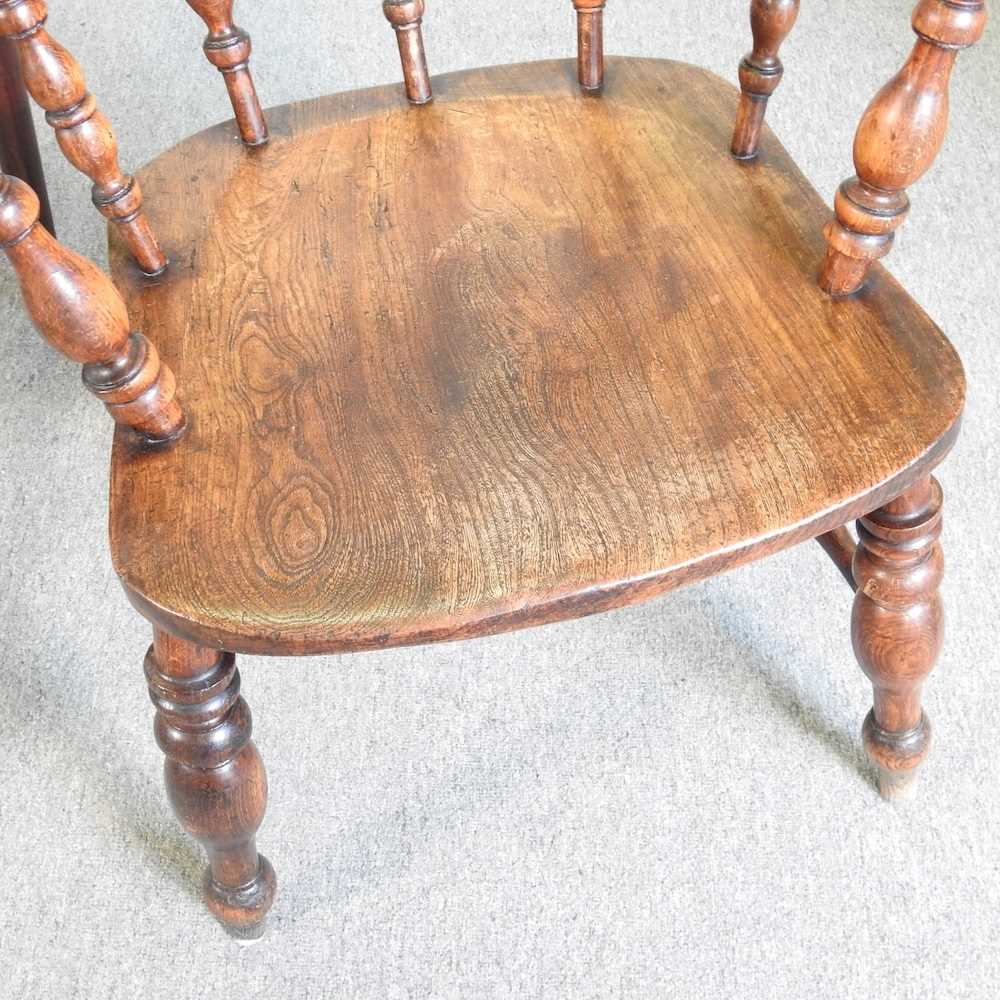 An early 20th century elm seated smokers bow armchair, together with an 18th century pembroke - Image 4 of 6