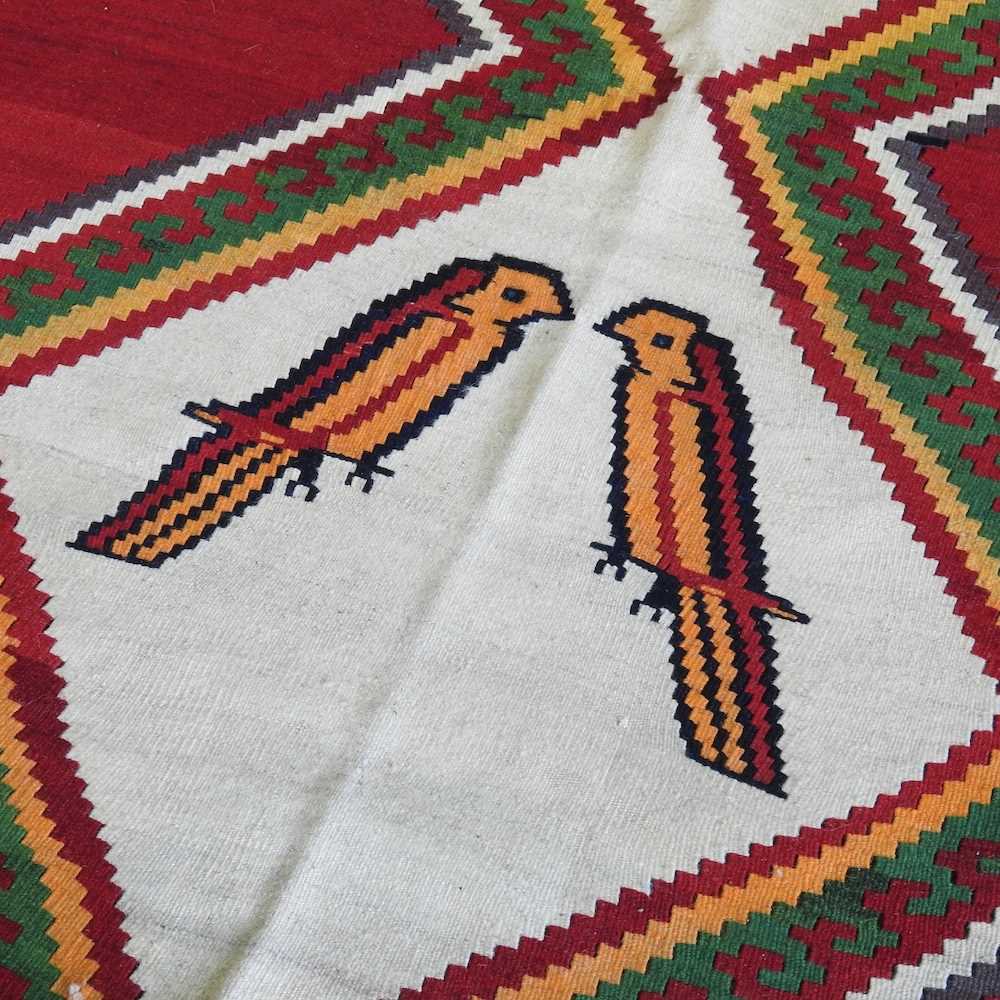 A kilim rug, with a cream central panel, decorated with birds, 290 x 145cm - Image 3 of 5