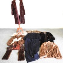 A collection of vintage fur coats and stoles, to include an Yves Saint Laurent three piece suit