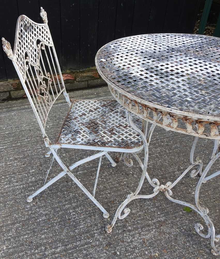 A cream painted metal circular garden table, together with a pair of folding chairs (3) 76w x 78h - Image 3 of 3