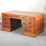 A large reproduction yew wood pedestal desk, with an inset top 152w x 90d x 77h cm