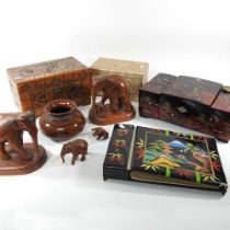 A collection of Eastern boxes and carvings