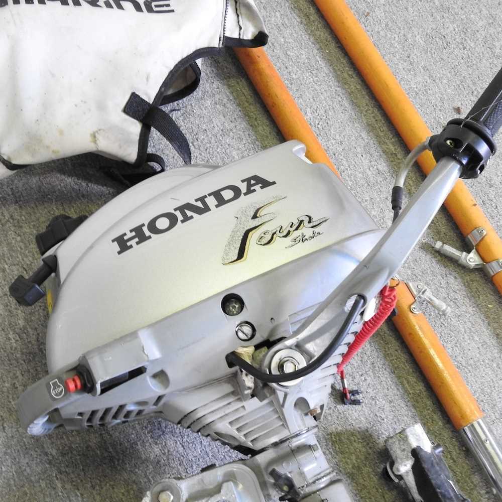 A Honda marine outboard motor, together with a pair of oars and spares - Image 3 of 6