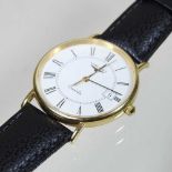 A Longines 18 carat gold cased gentleman's quartz wristwatch, with a signed 30mm dial, on a