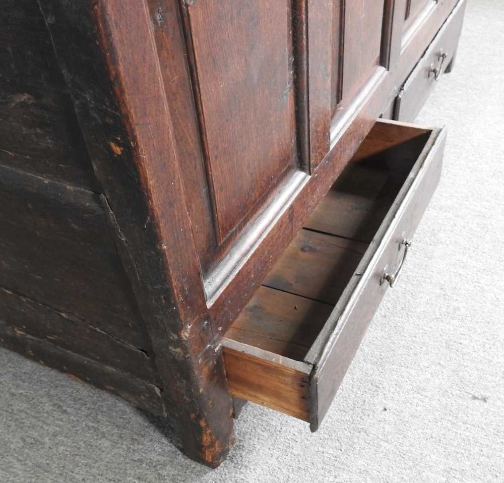 An 18th century oak mule chest, with a panelled front and drawers below 133w x 51d x 72h cm - Image 5 of 5