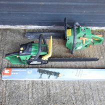A petrol chainsaw, together with another and a chainsaw trestle (3)