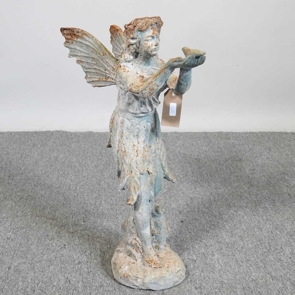 A model of a fairy, with a bird, 50cm high