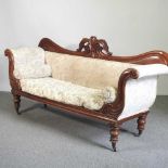 A 19th century carved mahogany double ended couch, upholstered in cream, on turned legs 210w x 56d x