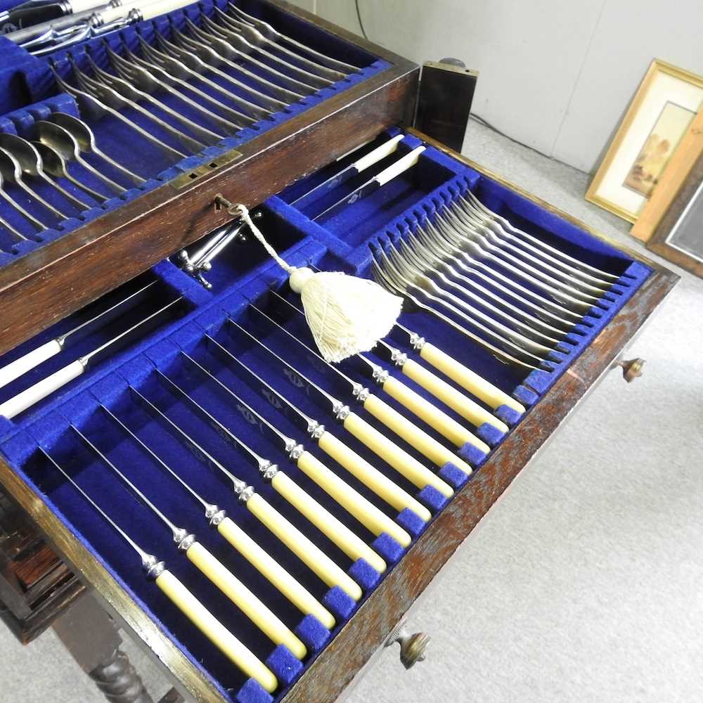 A 1920's canteen of silver plated cutlery, with a hinged lid and drawers below, with a twelve - Image 4 of 8