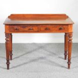A Victorian mahogany side table, with a gallery back, on a turned legs 106w x 75h x 52d cm