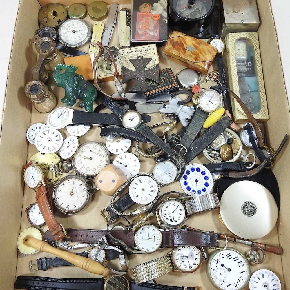 A collection of pocket watch parts, wristwatches and other items