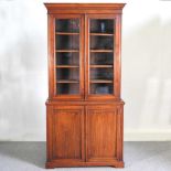 A Victorian walnut cabinet bookcase, fitted with shelves 107w x 46d x 222h cm