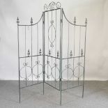 A metal folding garden screen, with three panels 182w x 184h cm